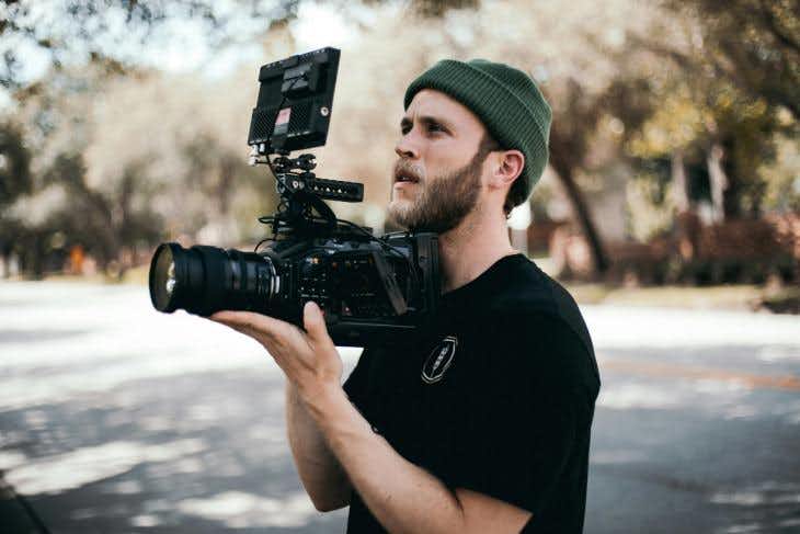 Man holding a professional camera