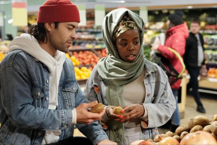 A couple buying groceries