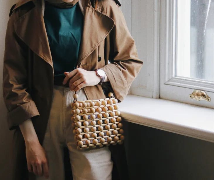 A woman in a beige and green combination