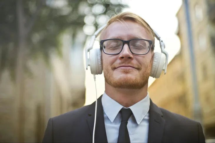 A man listening to music with headphones