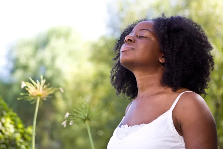 A peaceful woman enjoying the nature