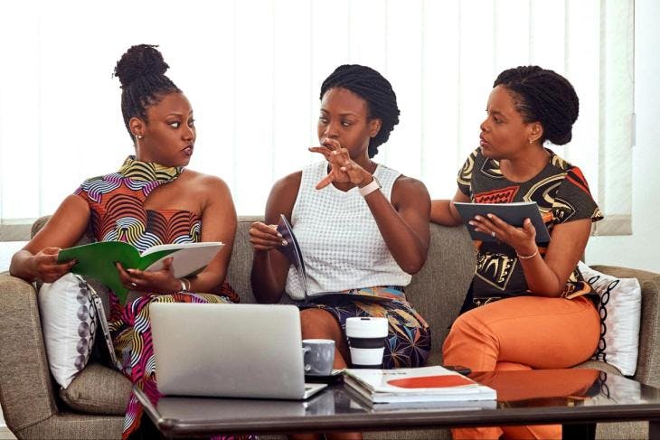 Three women discussing work - enneagram 6 leadership