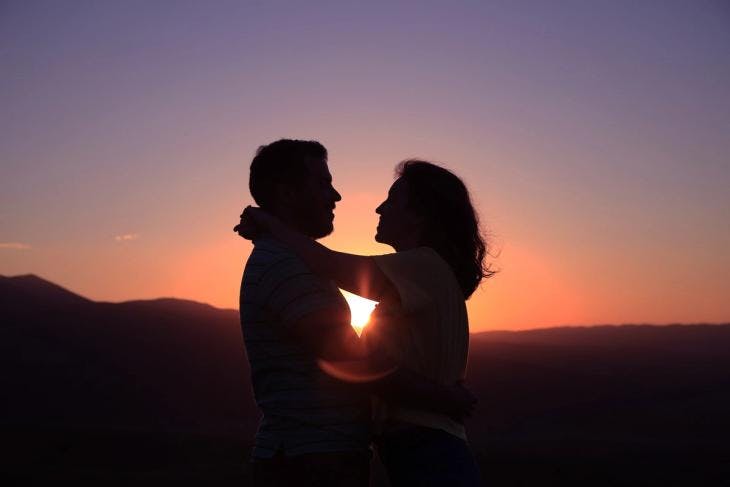 couple silhouette during sunset