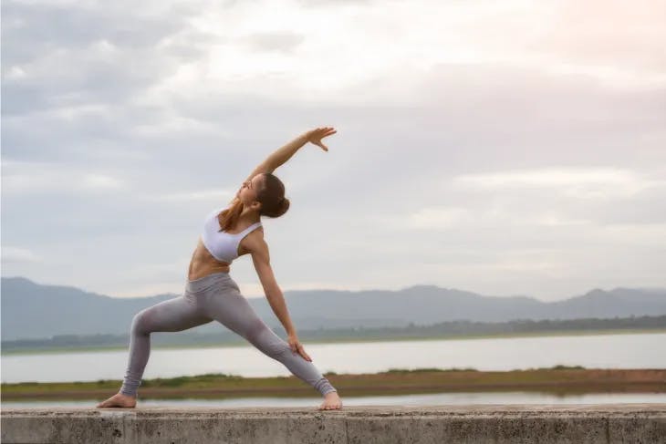 A woman exercising in nature