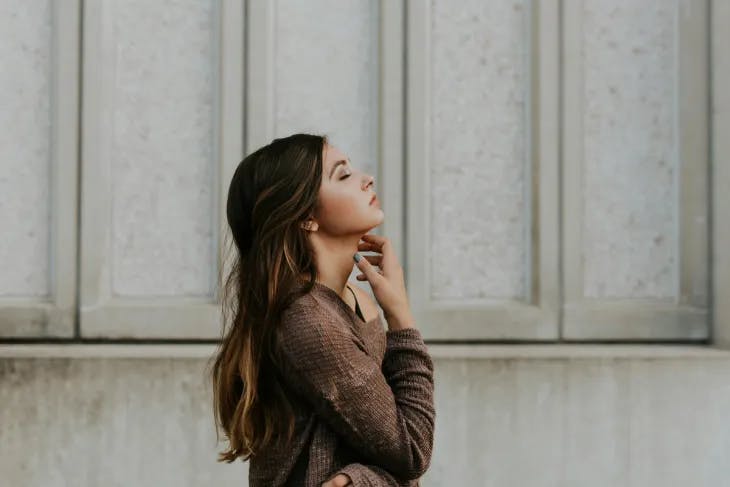 Woman in a tranquil moment with her eyes closed