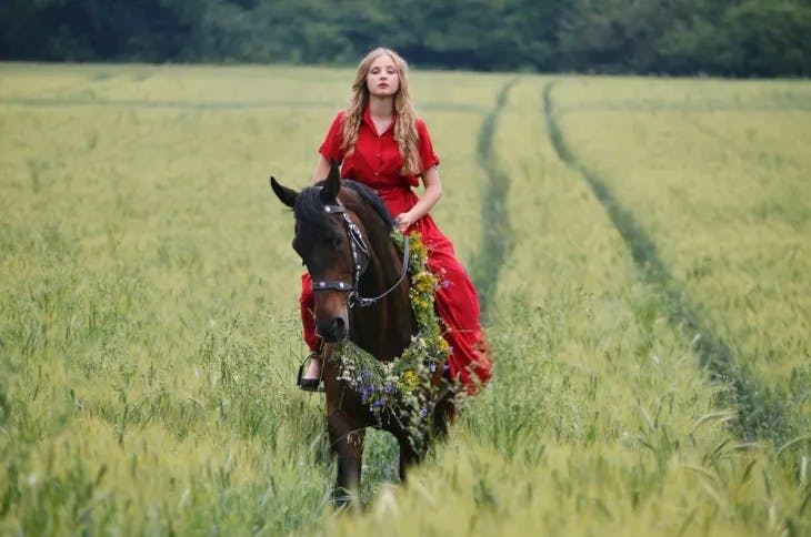 A woman horse-riding