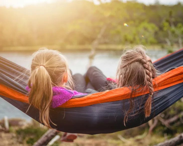 Two women lying in a hammock - enneagram 5 and 6 misidentification