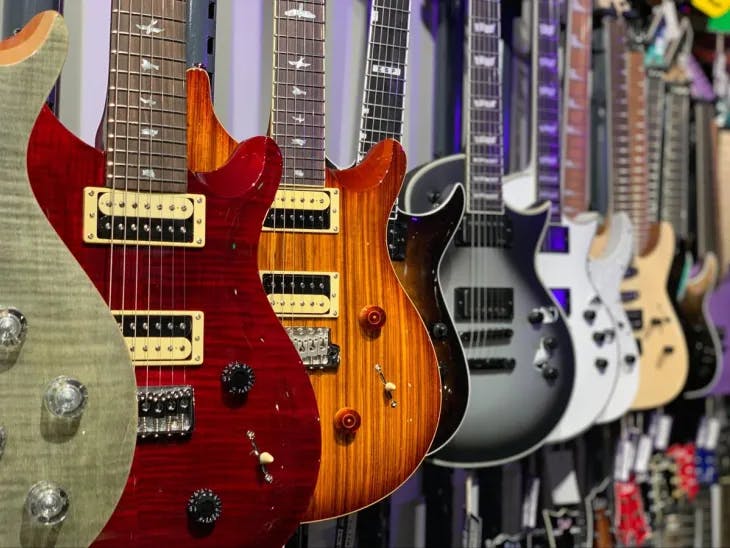 Display of hanging guitars