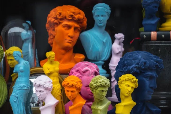 Colorful sculptures depicting ancient figures