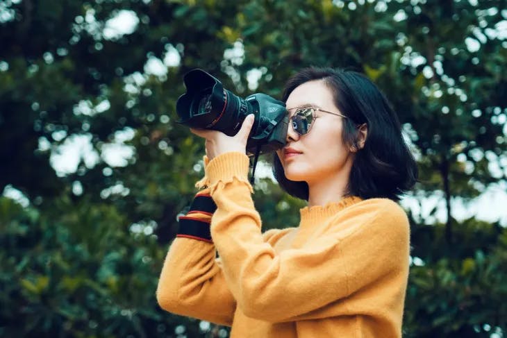 Girl photographing nature