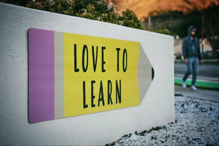 A sign that says love to learn