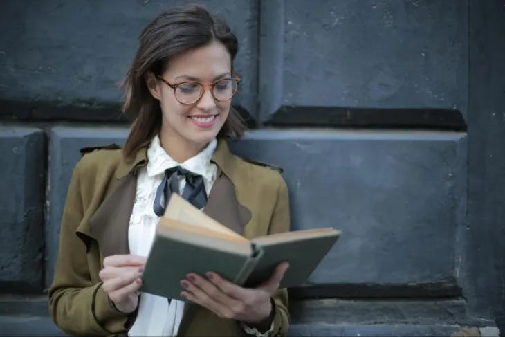 Enneagram 6 female reading a book